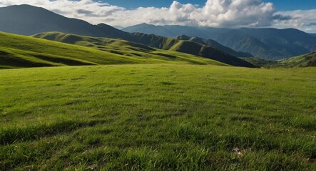 landscape in the summer, green mountain, clouds on mountains, clouds on green grass, beautiful view