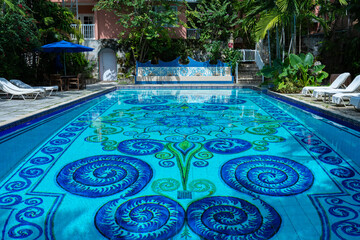 Swimming pool with beautiful blue and green design