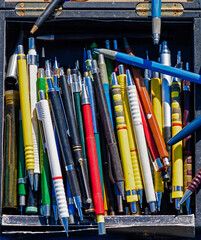 Pile of mechanical pencils inside box sold on a street market - 771656179