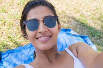 Young indian woman happy in pool