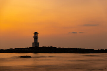 Long exposure shot of lighthouse on Khao Lak beach, Krabi, during the sunset, a popular destination in southern of Thailand