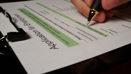 19 photo hispanic male hand filling out writing employment application form