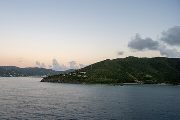 sun rise in the caribbean sea over islands