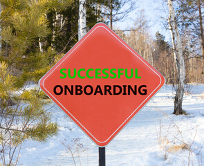 Successful onboarding symbol. Concept words Successful onboarding on beautiful red road sign. Beautiful forest snow blue sky background. Business successful onboarding concept. Copy space.