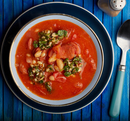 Traditional Spanish chorizo stew with pesto to garnish.