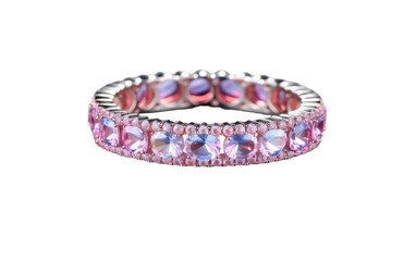 A pink and purple ring delicately sits on a pure white background