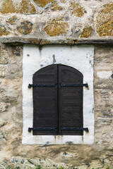 Old Wooden Arch window in a stone building in Trondheim - 771691504