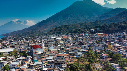 Aerial views of towns around Lake Atitlan. - obrazy, fototapety, plakaty