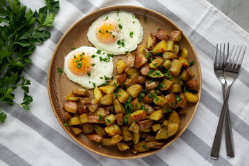 Homemade Garlic Herb Roasted Potatoes on a Plate, top view. Flat lay, overhead, from above.