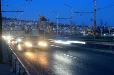 Cars rushing over the bridge in the city of Varna (Bulgaria)  - obrazy, fototapety, plakaty