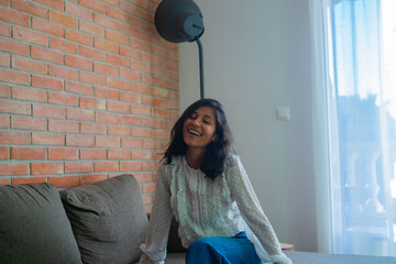 young woman happy at home