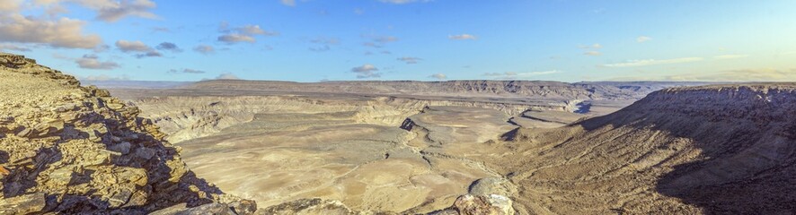 Panoramic picture of the Fish River Canyon in Namibia taken from the upper edge of the south side