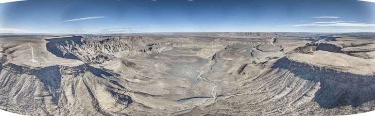 Panoramic drone picture of the Fish River Canyon in Namibia taken from the upper edge of the south...