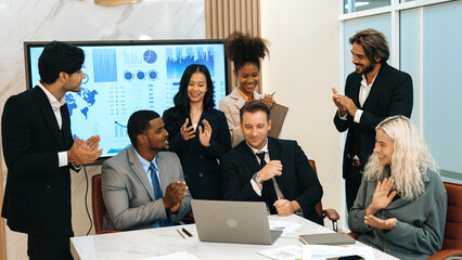 Diverse group of office worker and employee applauding, happy collaborate on strategic business...