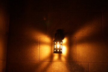 Light fixture on stone wall, Bokeh