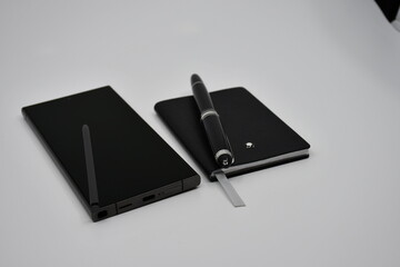 Luxury Smartphone and luxury notebook with pen