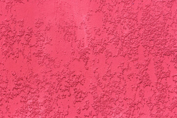 Pink paint rough plaster wall surface solid abstract stucco pattern background texture cement concrete