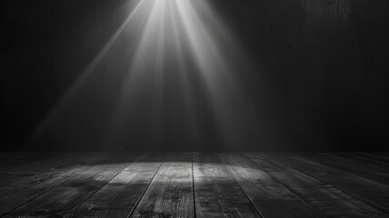Black room with light rays on wooden floor - Dramatic rays of light piercing the darkness, shining down on a textured wooden floor in a somber setting - obrazy, fototapety, plakaty