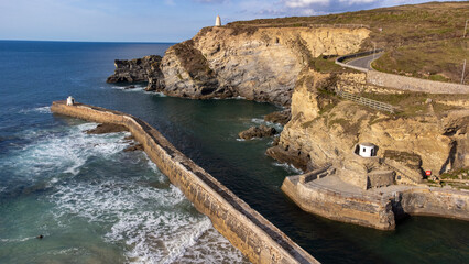 Harbour wall and cliffs