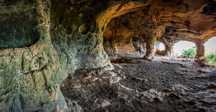 Sa Cova des Voltor, (the vulture cave), crosses carved in sandstone, historic sandstone quarry, Petra, Majorca, Balearic Islands, Spain
