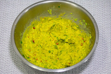 Traditional Guacamole sauce texture closeup. Mexican food.