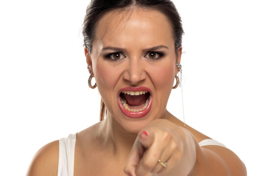 Nervous woman screams yell shout on a white background