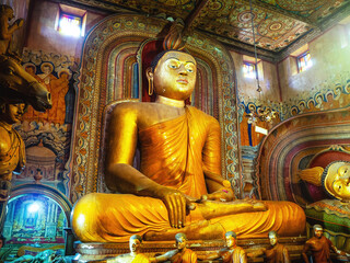 giant golden sitting buddha in Sri Lanka temple bottom view. Wewurukannala Buduraja Maha Viharaya...