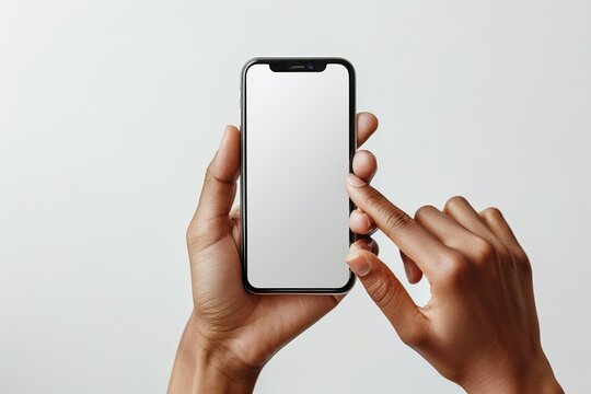 Hands use a blank smartphone, representing modern communication technology with copy space.