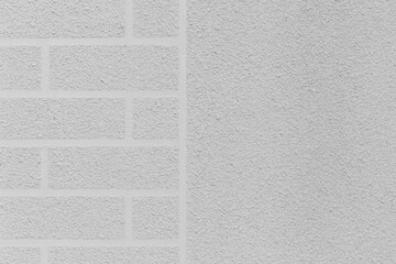 Fototapeta premium Grey rough wall brick abstract pattern white plaster texture background design facade exterior