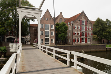 Drawbridge over and historic canal houses in the center of the Dutch city of Zwolle.
