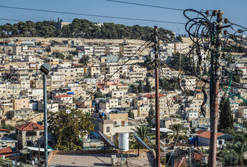 Buildings in Silwan district inhabited mainly by Palestinians in Jerusalem, Israel - obrazy, fototapety, plakaty