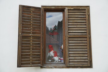 window with red shutters