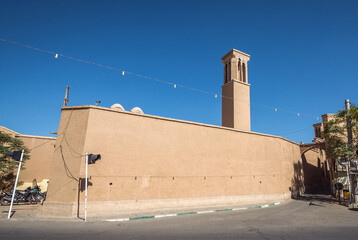 Wind catcher tower seen from Alavi Street in Kashan city, Iran