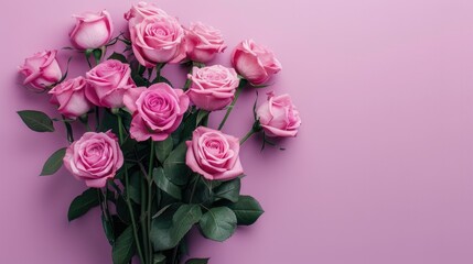 Bouquet of pink roses on a pastel background, top view with copy space.
