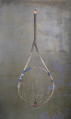 old fishing net on the wall