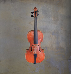 old violin on concrete background - 771789171