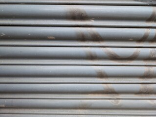 Metal shutters with graffiti