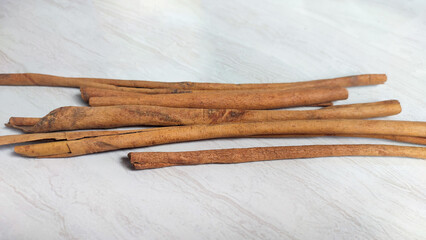 Pieces of dried cinnamon or Cinnamomum zeylanicum which is useful as a cooking spice and natural...