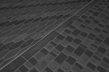 Two Kinds Paving Black Tiles Dividing Border Curb Mosaic Stone Street Road City Texture Background Dark