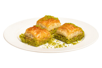 Baklava with pistachios isolated on white background. Turkish cuisine delicacies. Ramadan Dessert....