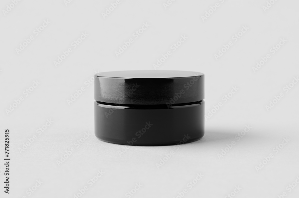 Wall mural black glass cream jar packaging mockup.