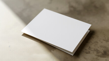 A minimalist white card placed neatly on a textured surface, open for personalization and uses mockup -- Generative AI