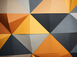 Background featuring geometric paper with autumn colors of gray, yellow, and orange.