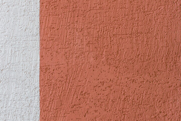 Wall two colors plaster brown paint and white surface stucco texture background abstract design blank space text empty