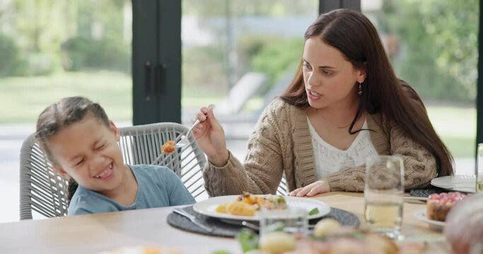 Feeding, refuse and mother with girl, home and eating with bad habits and family in a lounge. Single parent, mama and daughter with food and nutrition with dislike and breakfast with disgust or snack