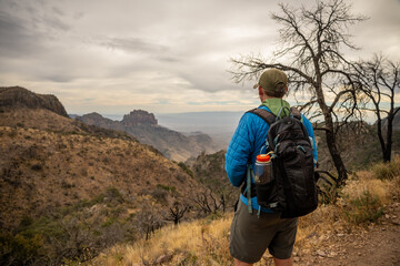 Man Looks out Over Big Bend Wilderness from Emory Peak Trail