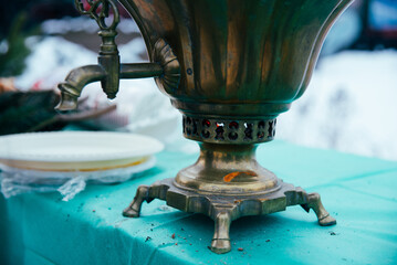 Antique Brass Samovar Tap Close-up. A close-up view of a vintage brass samovar tap, showcasing...