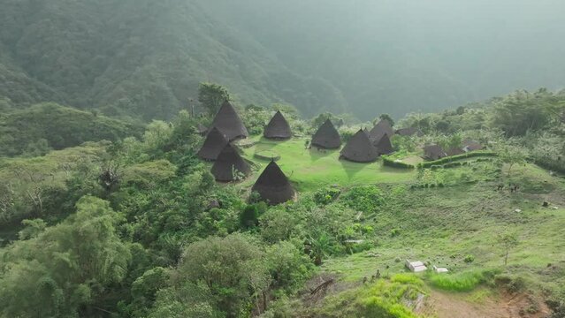 Aerial view of the remote and mysterious village of Wae Rebo, Indonesia