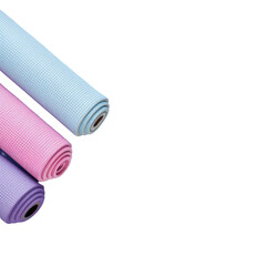 Three colored yoga mats stacked on transparent background