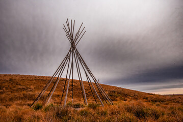 Tipi in autumn with clouds 